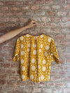 mustard lotus shirt